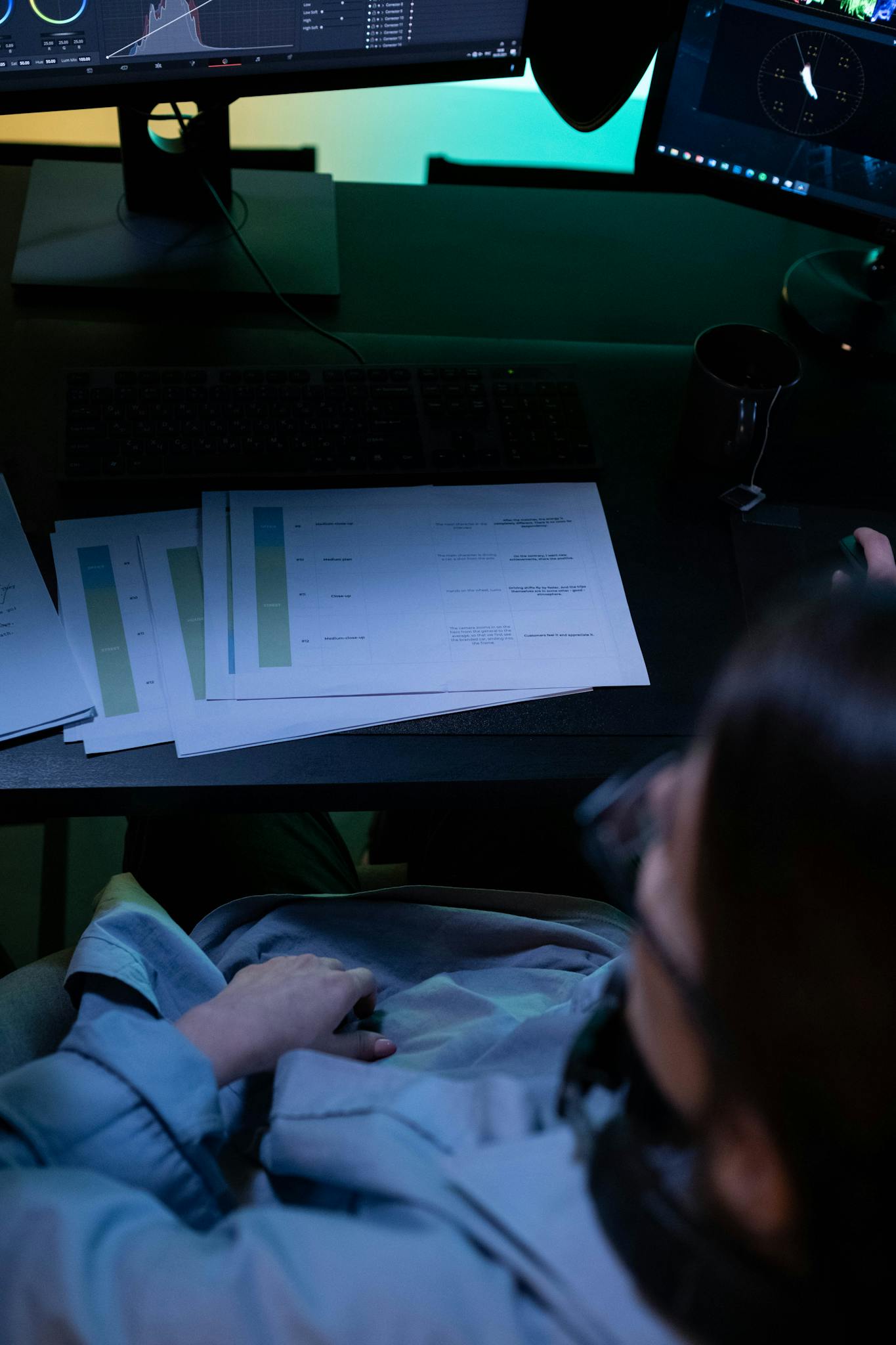 businesswoman analyzing financial documents on a computer